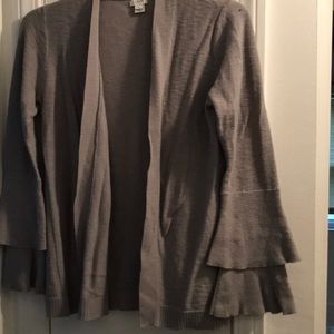 Woman’s J Crew sweater, with flared sleeves